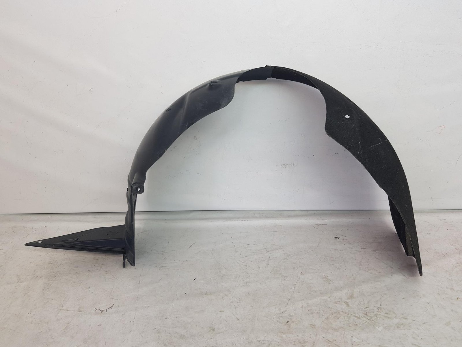 Carenaj roata stanga fata Ssangyong Tivoli X150 79711-35100 2016 2017 2018 2019 2020 2021 2022
